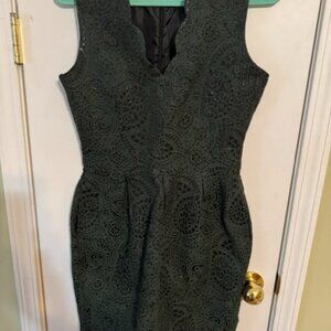 Gorgeous dark green dress. Scalloped neckline